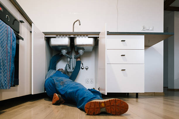 Professional Emergency Plumber technician working in Hunker, PA